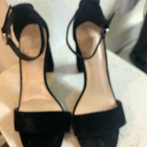 High heeled, black velvet shoes